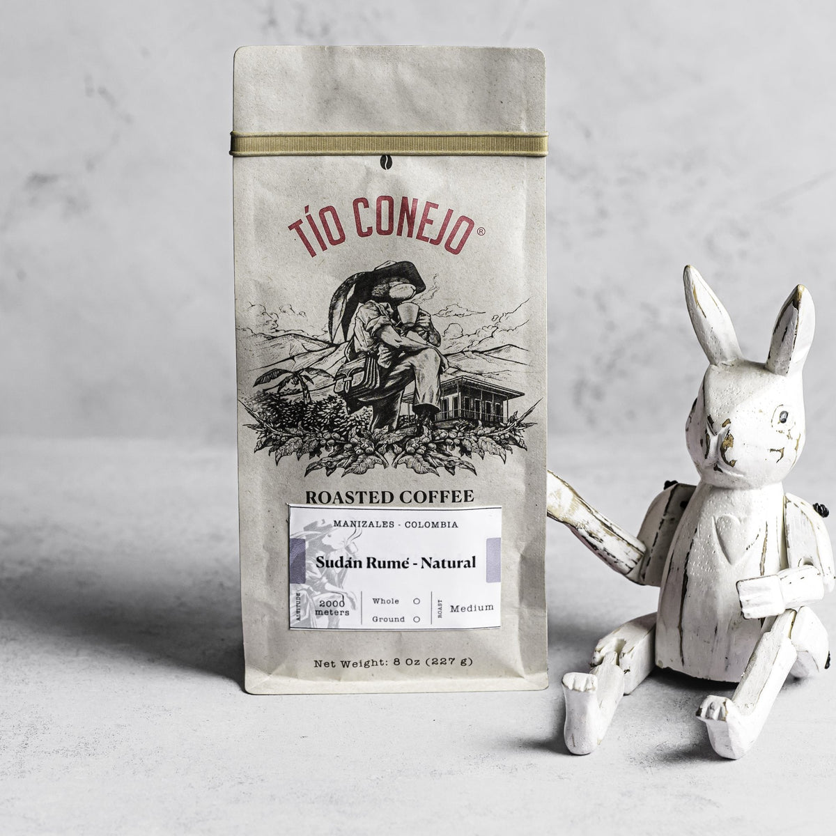 Sudan Rume Natural next to the Tío Conejo wooden rabbit