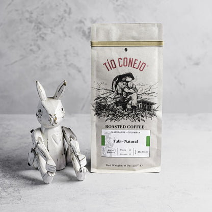 Tabi Natural next to the Tío Conejo wooden rabbit