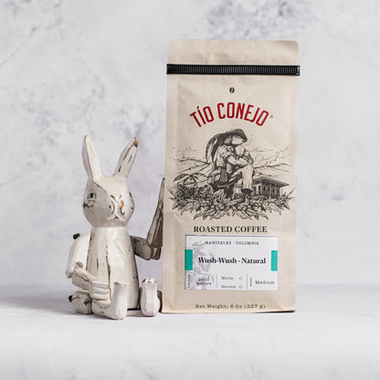 Wush Wush Natural next to the Tío Conejo wooden rabbit