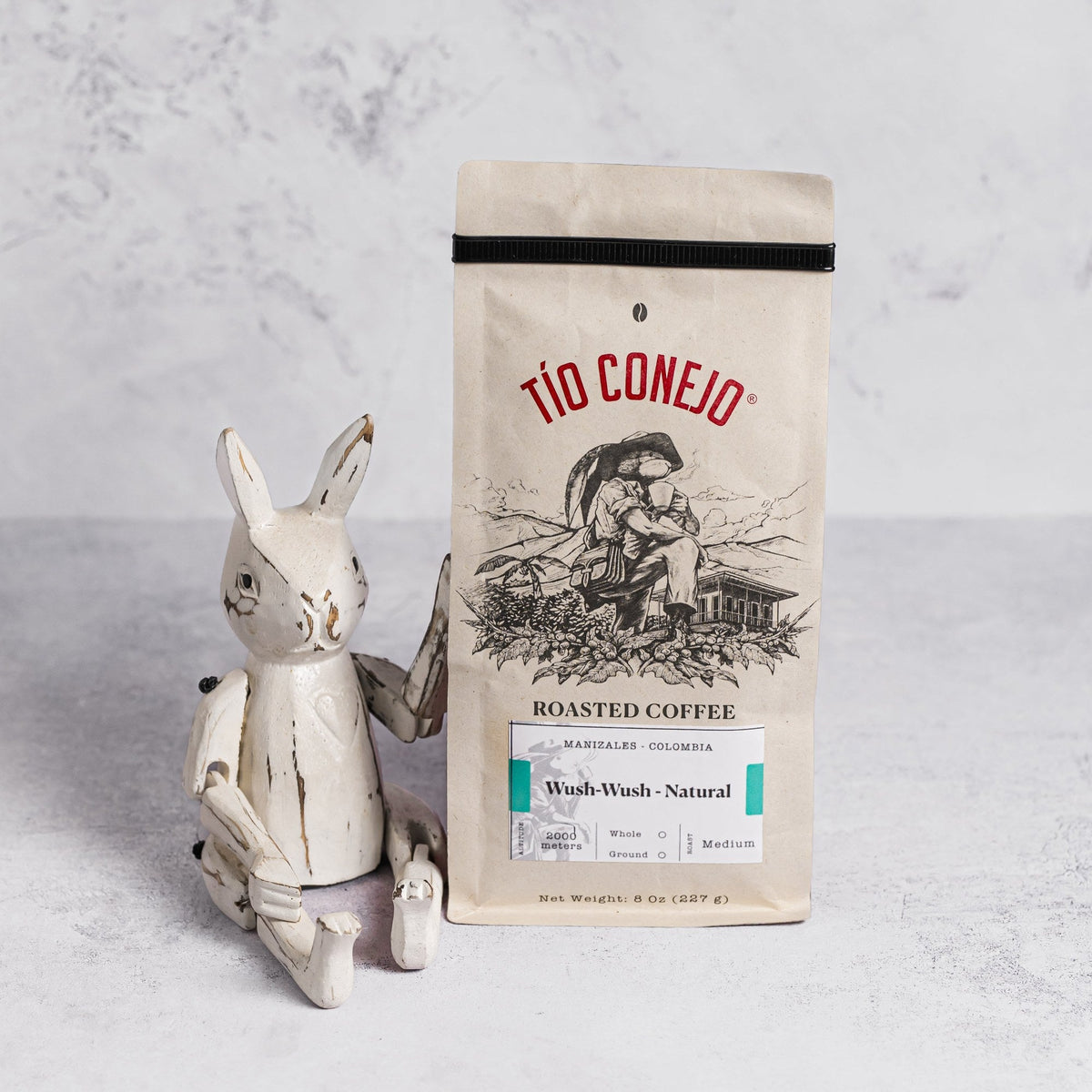 Wush Wush Natural next to the Tío Conejo wooden rabbit